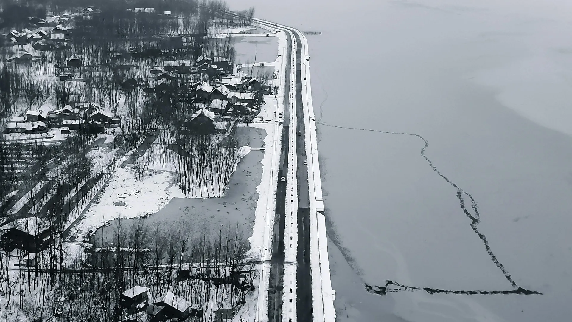 Aerial view of frozen Dal Lake in winter