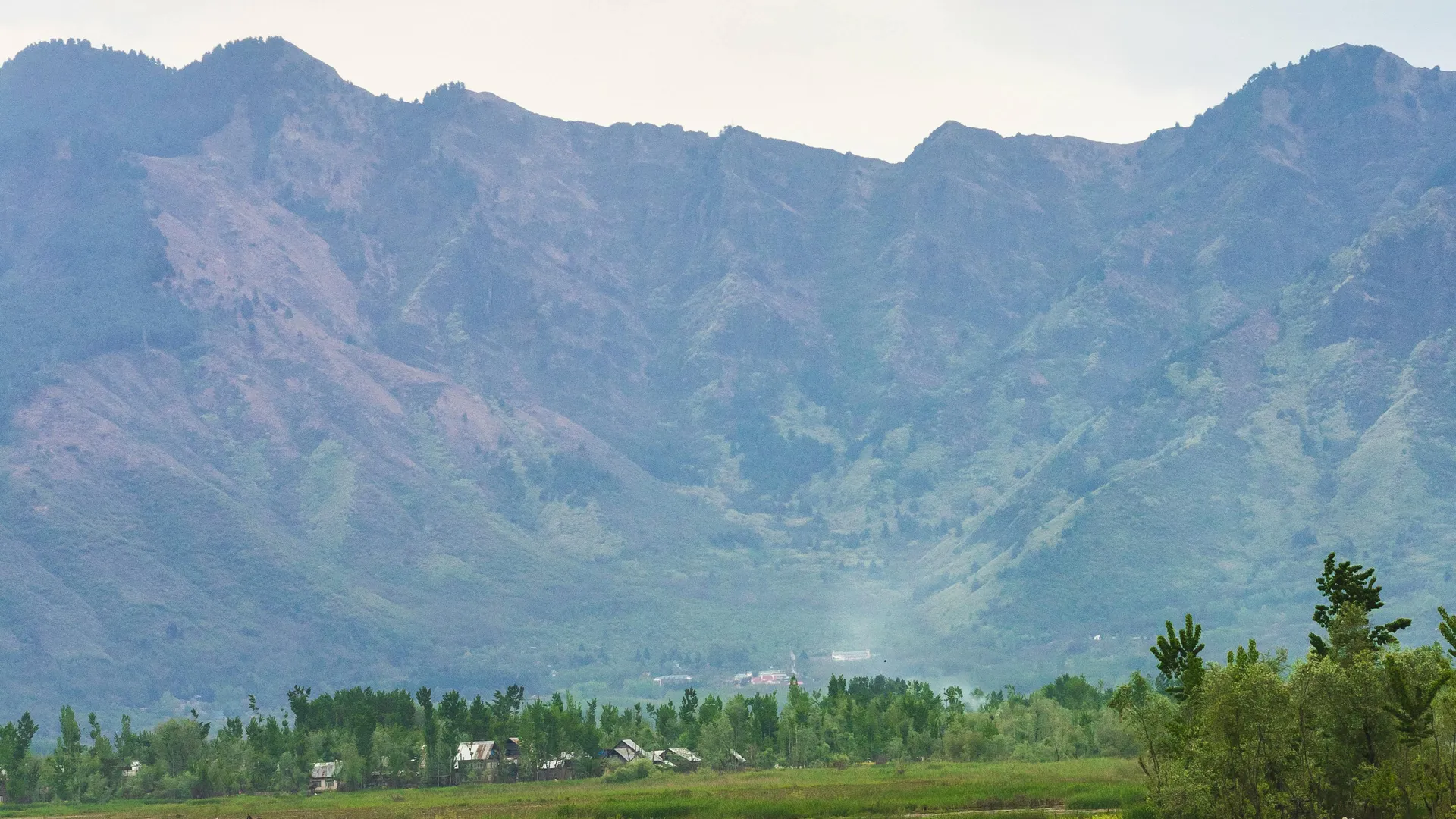 Dal Lake with scenic mountain backdrop