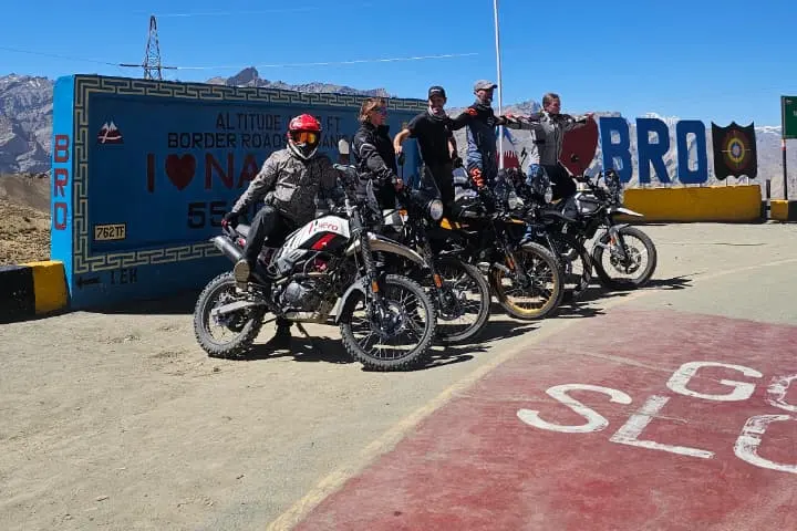 Ladakh bike trip group at a high-altitude pass