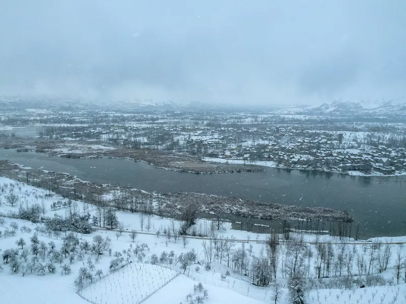 Snow-covered Kashmir valley aerial view