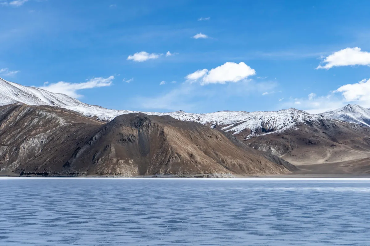 Frozen Pangong Tso surface in deep winter Ladakh